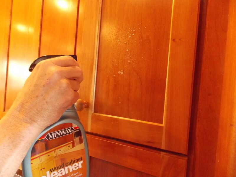 Stick with gentle cleaners on wood cabinets to be safe