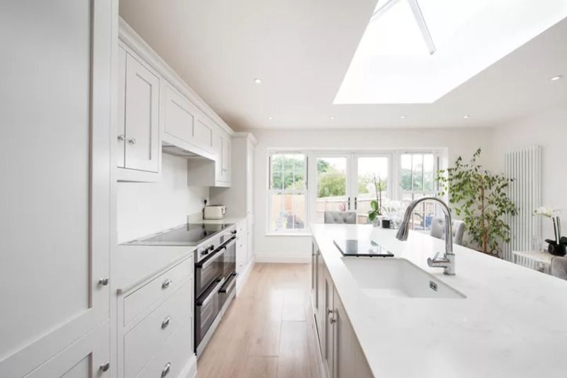 Stark white: This kitchen cabinets color is falling out of favor