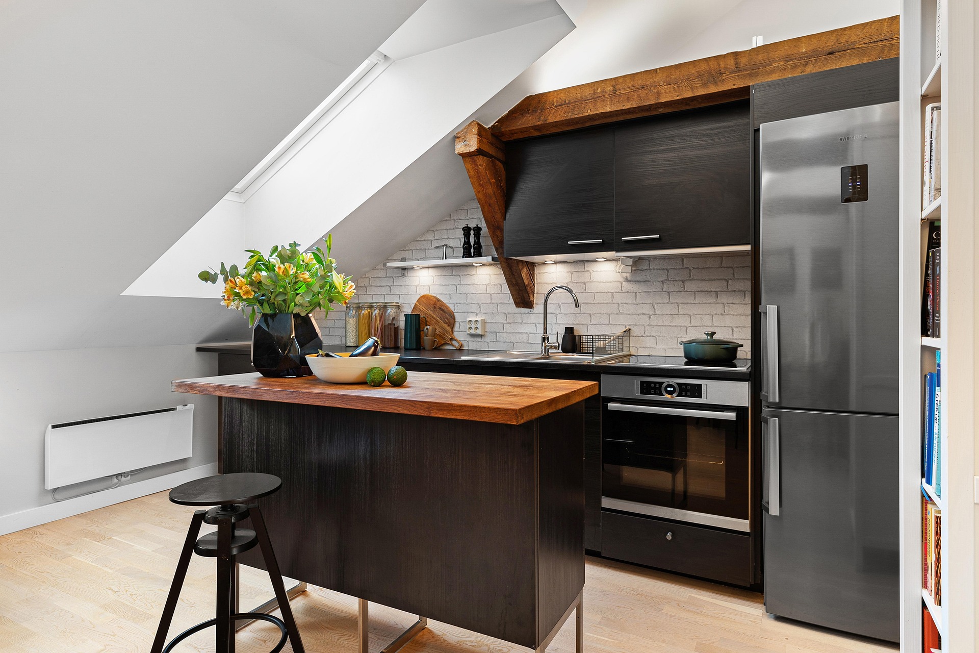 Luxury kitchen with two-tone cabinets and natural light design impact