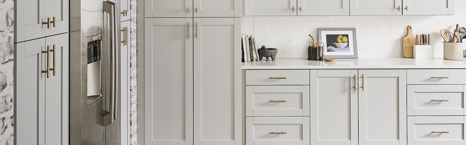 White shaker style kitchen cabinets in a bright