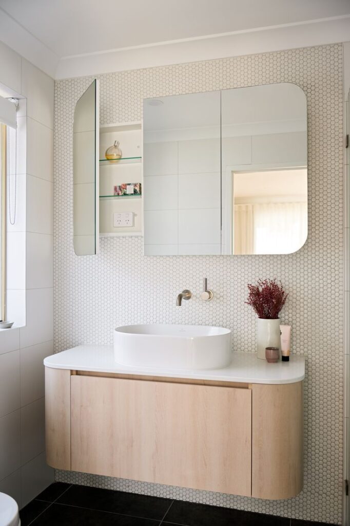 Modern bathroom vanity with frameless glass mirror cabinet and minimalist design