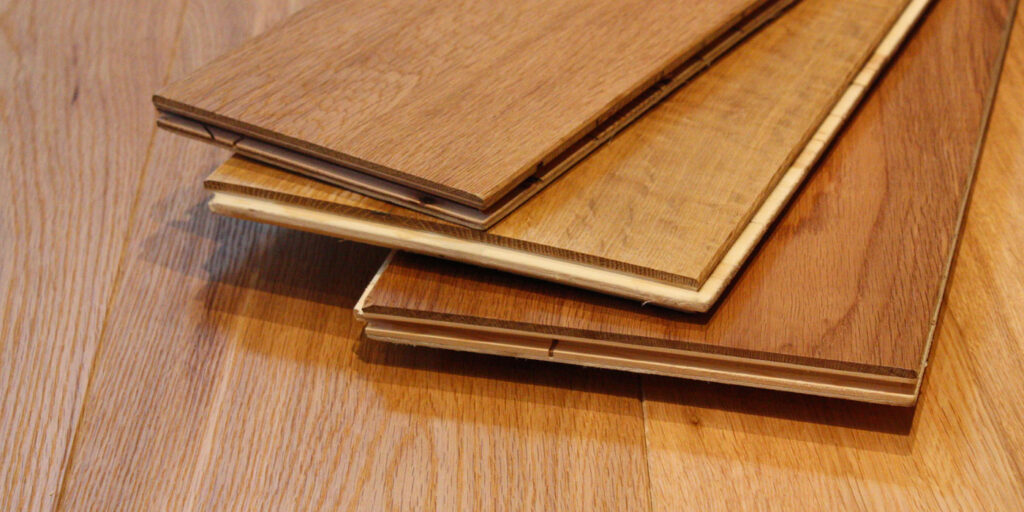 Engineered wood panels showing MDF, plywood, and particleboard layers for bathroom cabinets