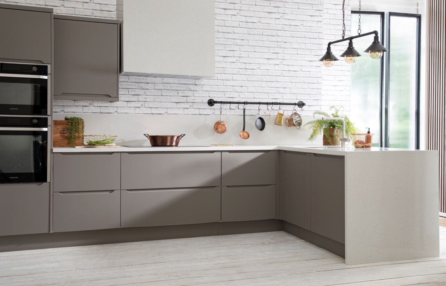 Modern Canadian kitchen with sleek RTA cabinets in grey finish and white countertop – stylish ready-to-assemble kitchen cabinets by rtadepot.ca