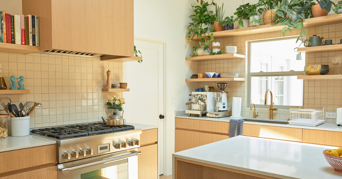Natural wood veneer kitchen cabinets with modern open shelving and plants in a bright Mississauga home