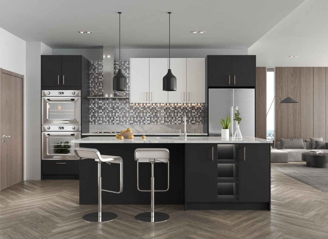 Modern kitchen with two-tone black and white RTA cabinets, quartz countertops, and mosaic tile backsplash for a sleek contemporary design.