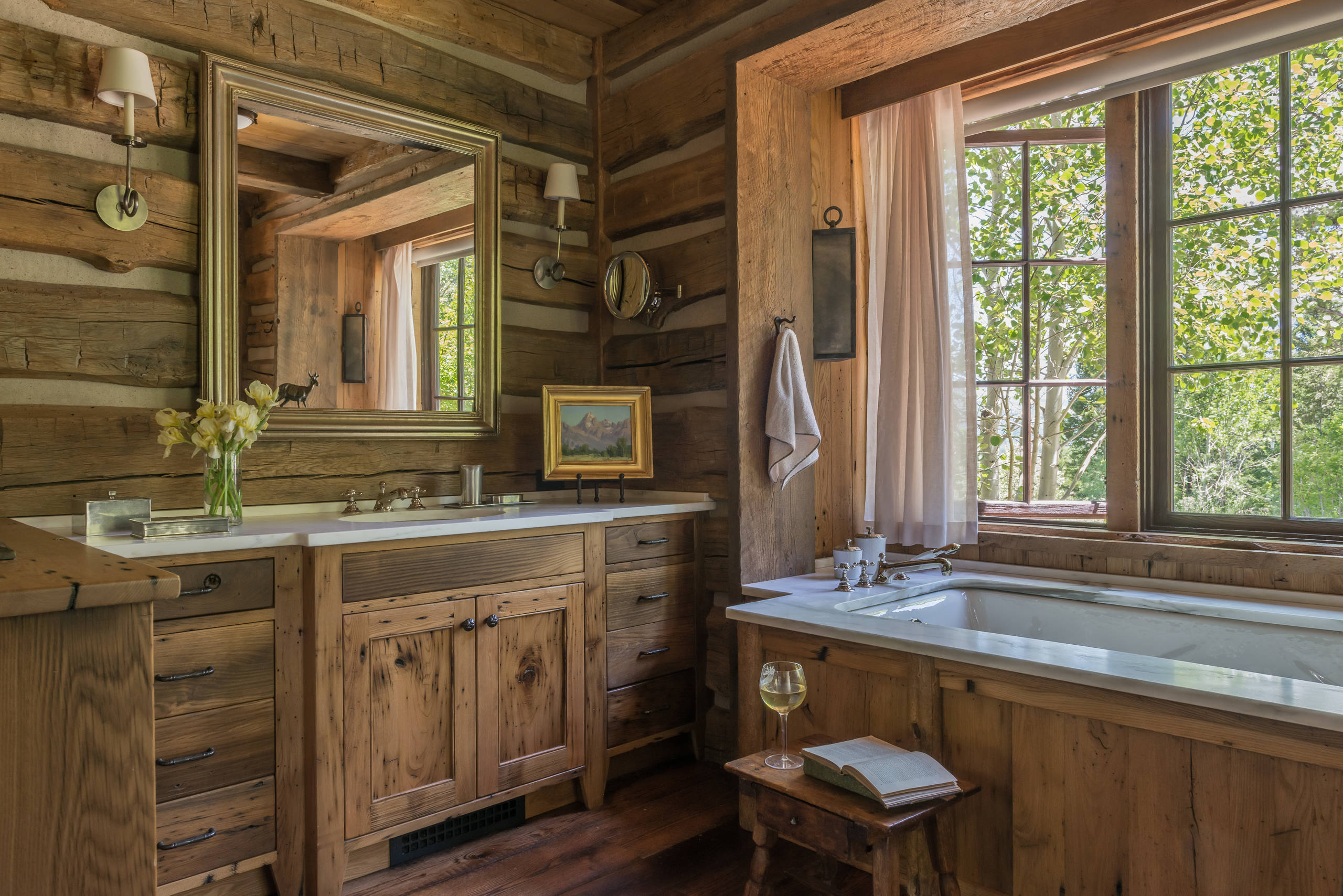 Rustic-style bathroom cabinets with natural wood vanity and farmhouse charm in a Canadian cottage