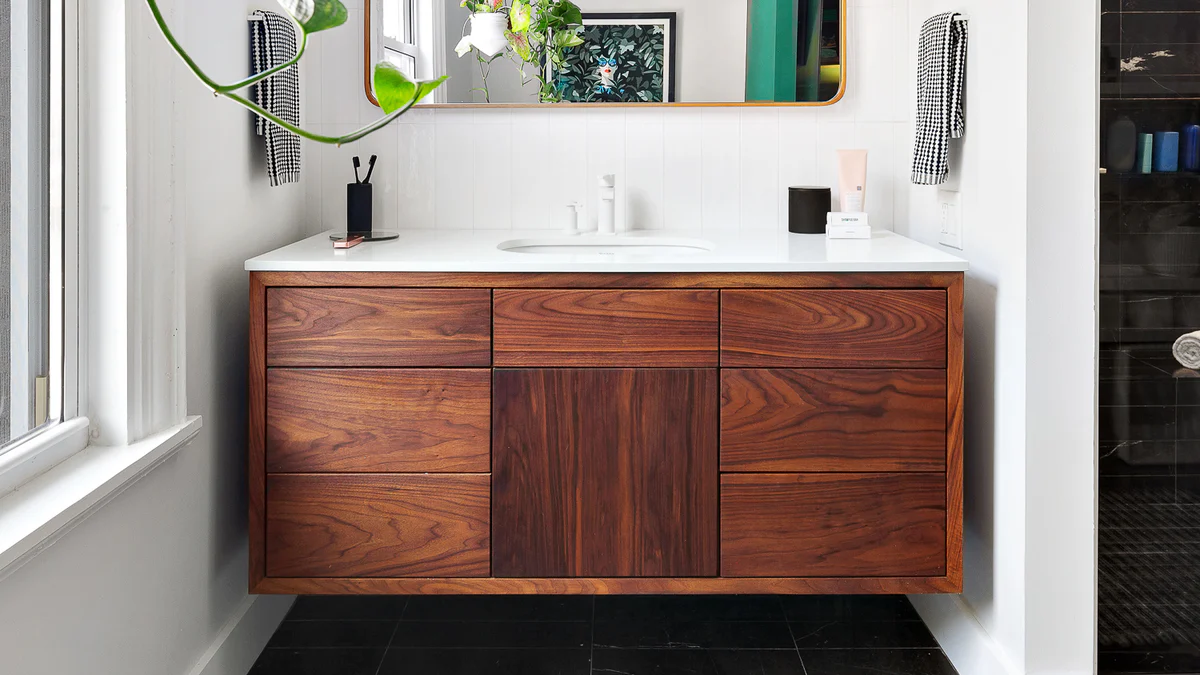 Engineered wood bathroom cabinets with modern floating vanity design in Mississauga home