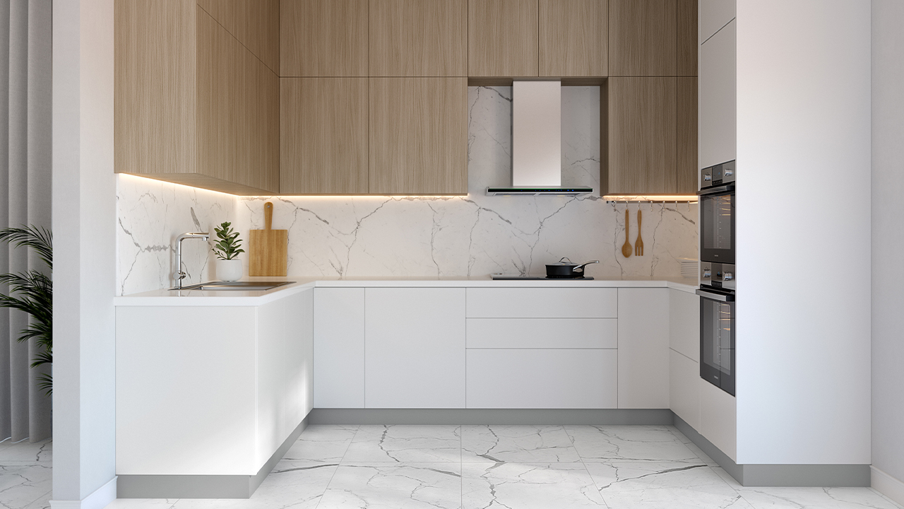 Modern minimalist kitchen in Canada featuring premium RTA cabinets with matte white and natural wood finishes, sleek marble backsplash, and integrated appliances.