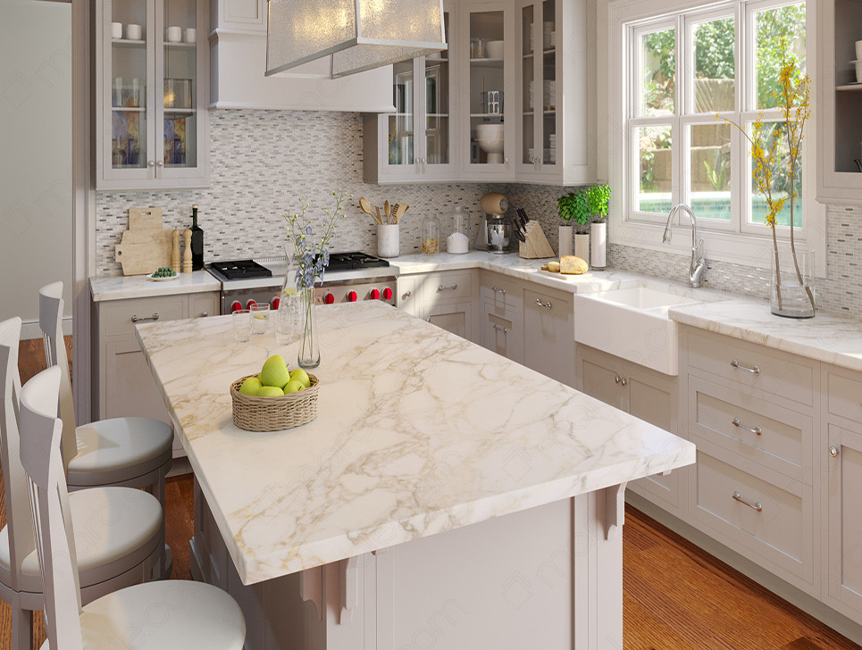 Bright modern kitchen with light shaker kitchen cabinets, large marble island, farmhouse sink, and mosaic tile backsplash.