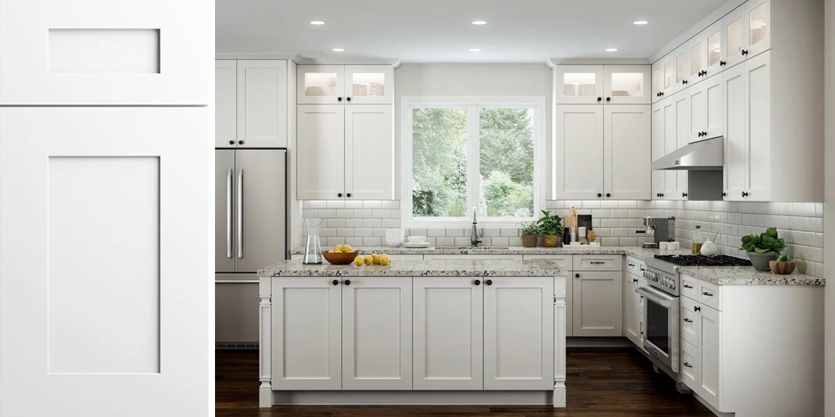Bright white Shaker kitchen cabinets with five-piece doors, quartz island and subway tile backsplash in a modern Canadian kitchen