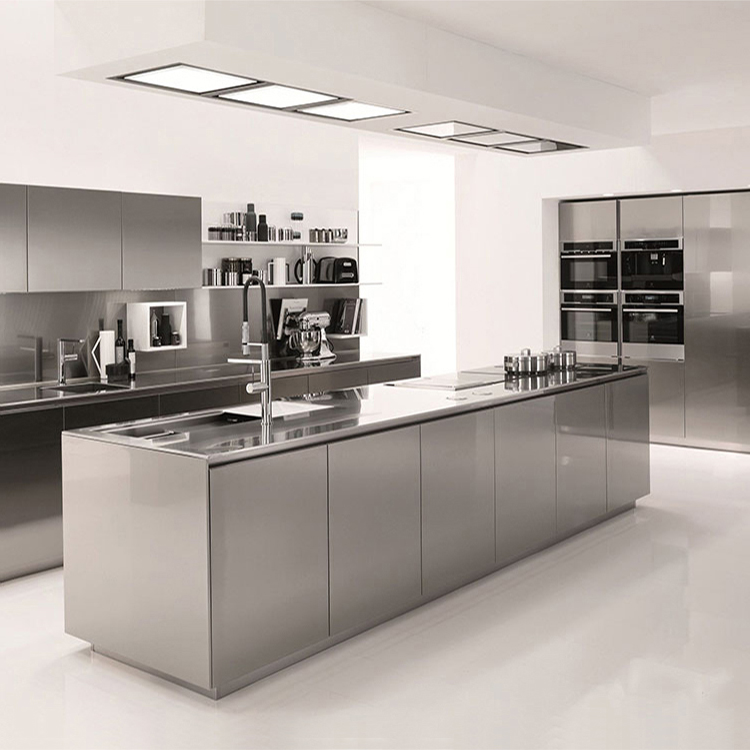 Sleek modern kitchen with stainless steel kitchen cabinets, large island, built-in ovens, and minimalist open shelving.