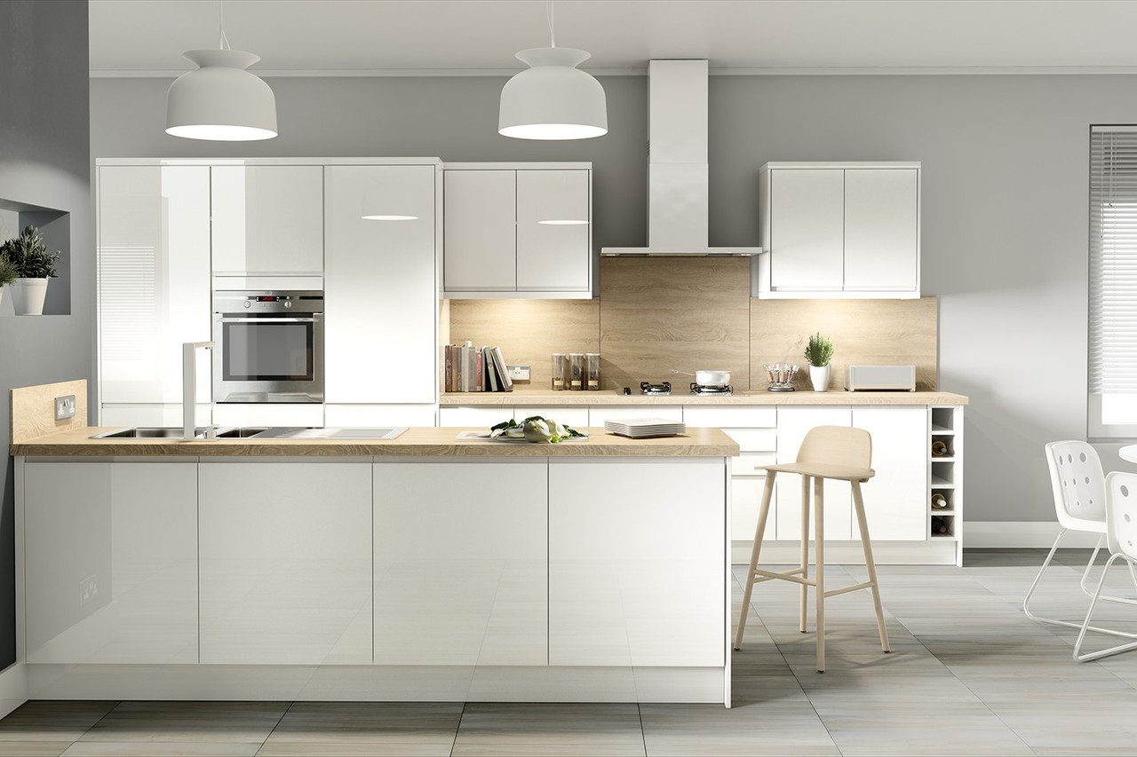 Modern white gloss kitchen cabinets with wood countertop and island from a Kitchen Cabinet Supplier
