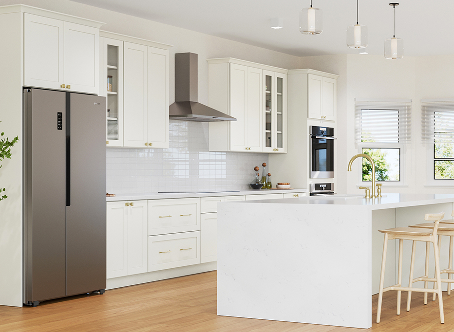 Bright modern kitchen with white shaker-style Premade kitchen cabinet units, brass hardware, stainless appliances, and a waterfall island.