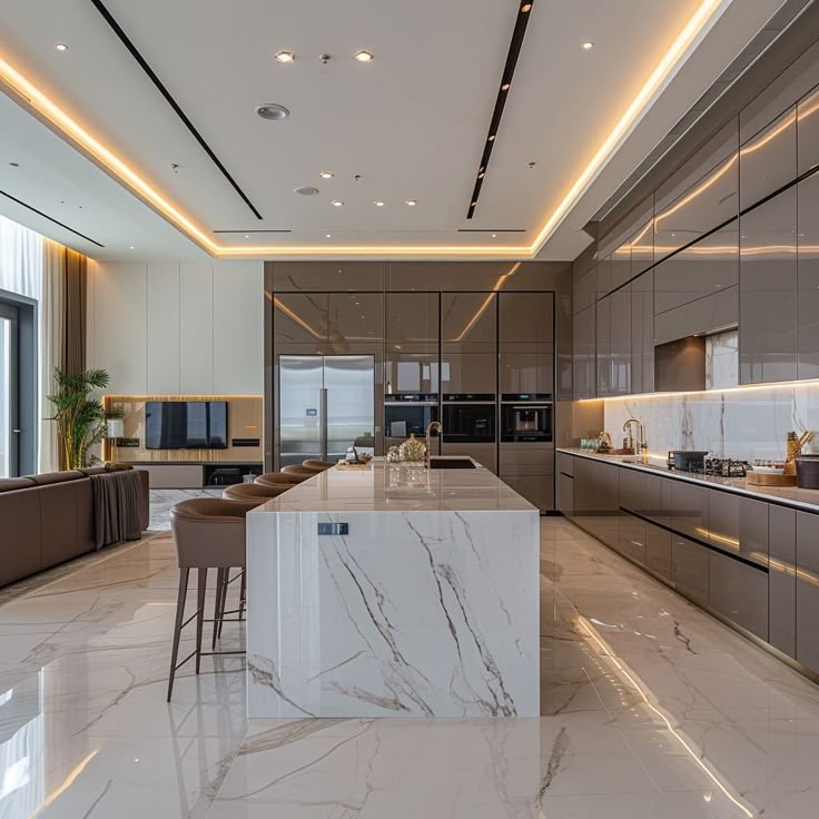 Modern luxury kitchen featuring high-gloss Kitchen Cabinet Mississauga storage solutions and a large marble island