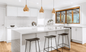 Flat pack kitchen cabinet with a modern white island, handleless cabinets, and minimalist design in a contemporary home