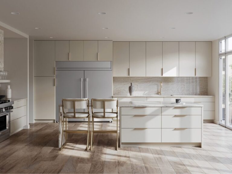 Modern minimalist kitchen with premium RTA kitchen cabinets Ontario, flat-panel cream cabinetry, large island drawers, and brass pulls