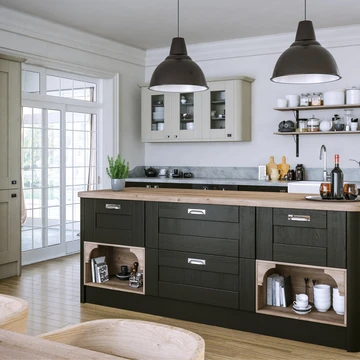 Modern flat pack kitchen cabinets with wood finish in an L-shaped kitchen design