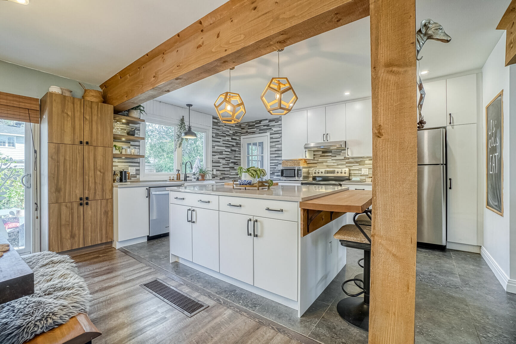 Low Price Kitchen Cabinet modern white shaker kitchen with large island, wood beam accents, and stainless steel appliances