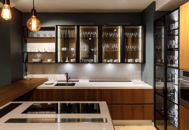 Modern premium kitchen design with glass cabinets and island in Toronto