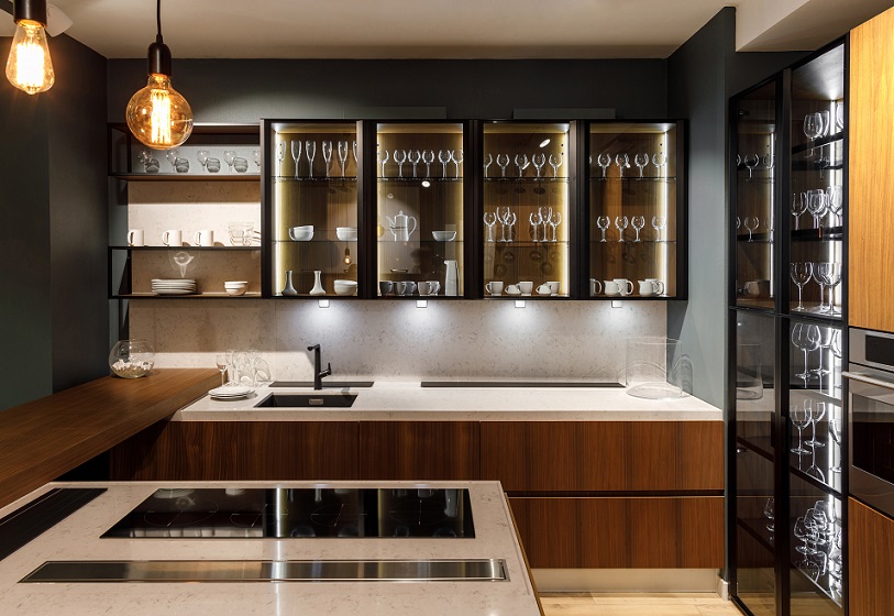 Modern premium kitchen design with glass cabinets and island in Toronto