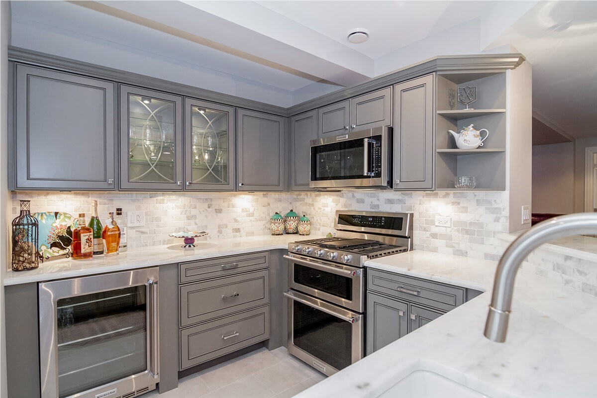 Modern grey kitchen cabinets from a kitchen cabinet supplier for basement kitchen renovation in Toronto