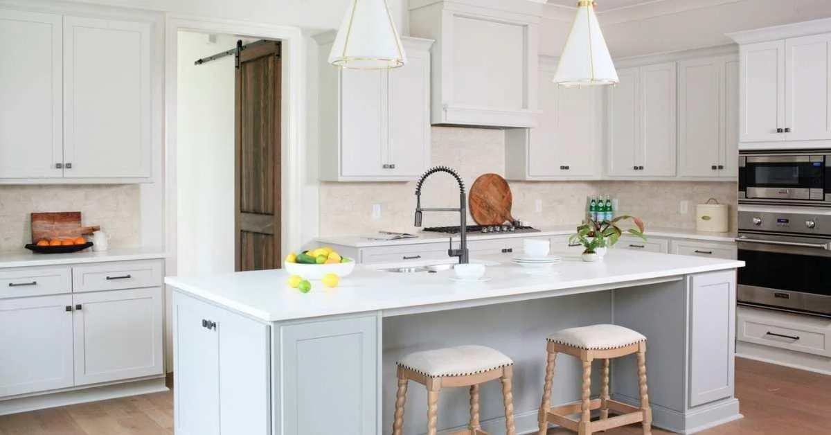 Kitchen cabinet solutions with white shaker cabinets and a large island for modern storage