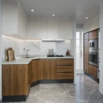 Modern two-tone RTA kitchen cabinets with white uppers, walnut base cabinets, marble-look backsplash, and built-in oven in Canada