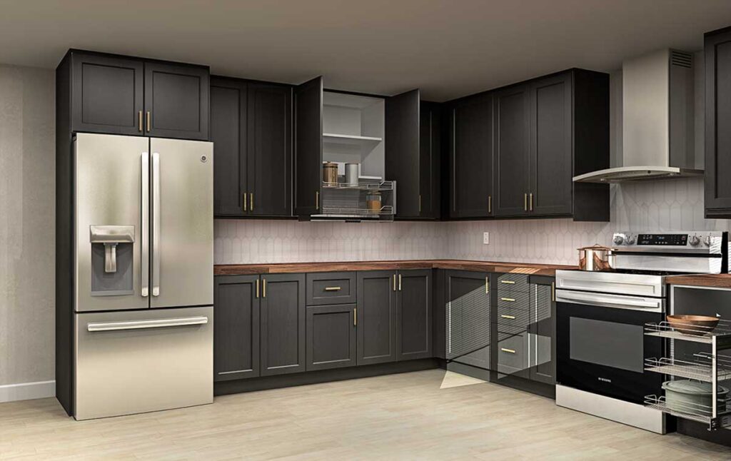 L-shaped kitchen with dark shaker IKEA kitchen cabinets, brass pulls, wood countertops, and stainless steel appliances.