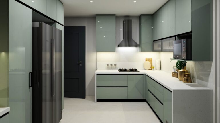 Modern U-shaped kitchen with glossy sage green cabinets and a white quartz countertop—best kitchen cabinet colors Canada.