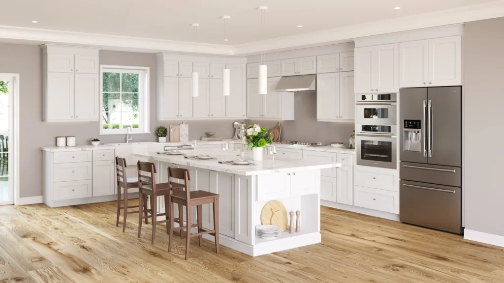 Bright modern kitchen featuring white shaker kitchen cabinets, a large central island, stainless steel appliances, and warm wood flooring in a stylish Kitchen Cabinets Hamilton design.