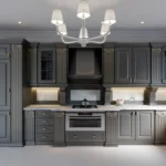 Luxury Kitchen Cabinets Oakville design with dark gray cabinetry, ornate trim, marble countertops, and warm under-cabinet lighting.