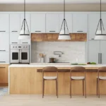 Modern two-tone kitchen cabinets Mississauga with matte white uppers, light oak base cabinets, a large island, and black hardware.