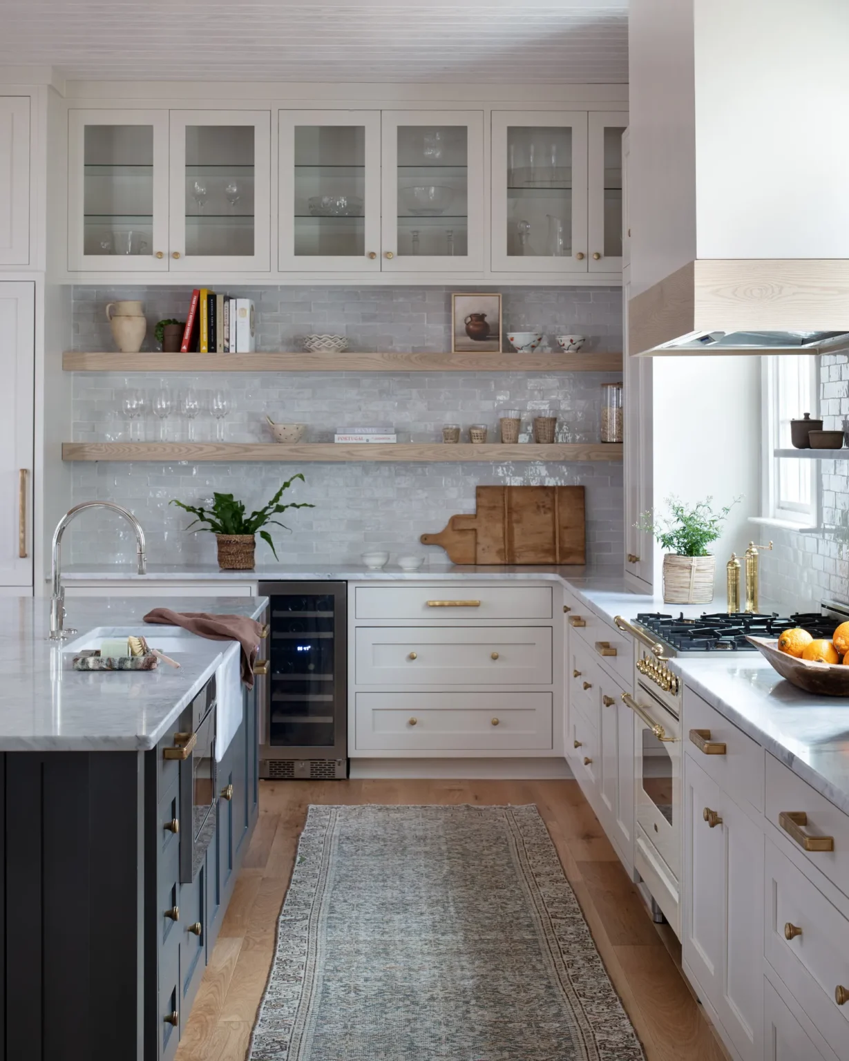 Modern kitchen cabinet upgrades with white shaker cabinets and brass hardware