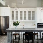 Kitchen Cabinets Brampton in a modern white kitchen with large island