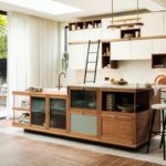 Modern kitchen with island featuring RTA kitchen cabinets in white and walnut finish