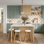 ikea kitchen cabinets in sage green with natural wood island