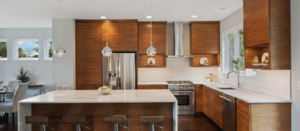 Modern kitchen featuring one of the best kitchen cabinet colors Canada in rich wood tone