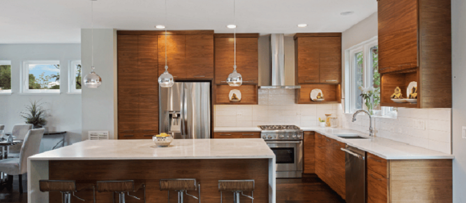 Modern kitchen featuring one of the best kitchen cabinet colors Canada in rich wood tone