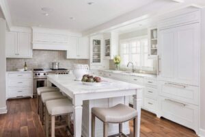 modern white kitchen cabinet doors with large island and custom storage cabinets