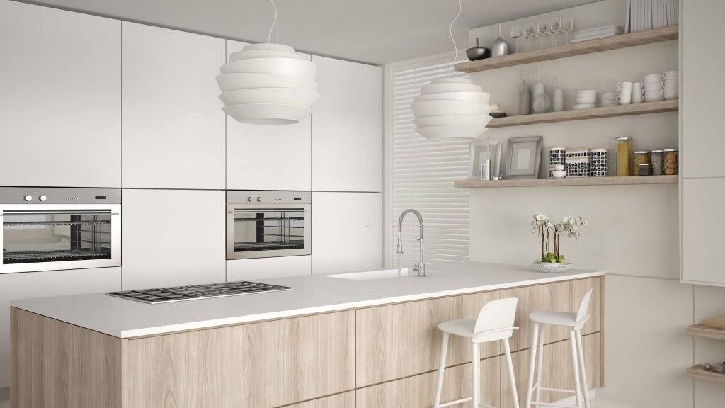 Glossy white kitchen cabinets with modern island design in Toronto & Mississauga homes