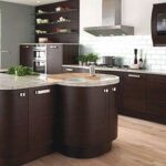 ikea kitchen cabinets in a modern dark wood kitchen with island