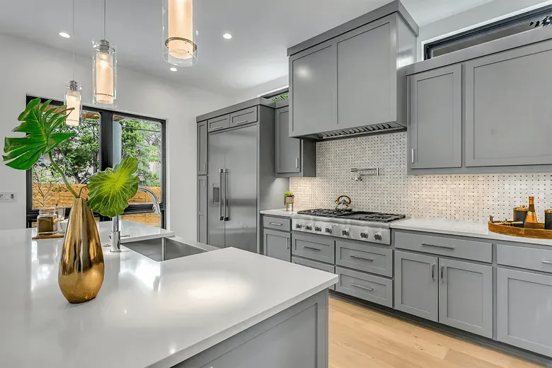 Ready-to-assemble kitchen cabinets in a modern gray kitchen design