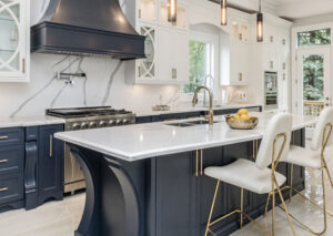 Kitchen Cabinets Oakville in a luxury modern kitchen with navy island and white cabinetry
