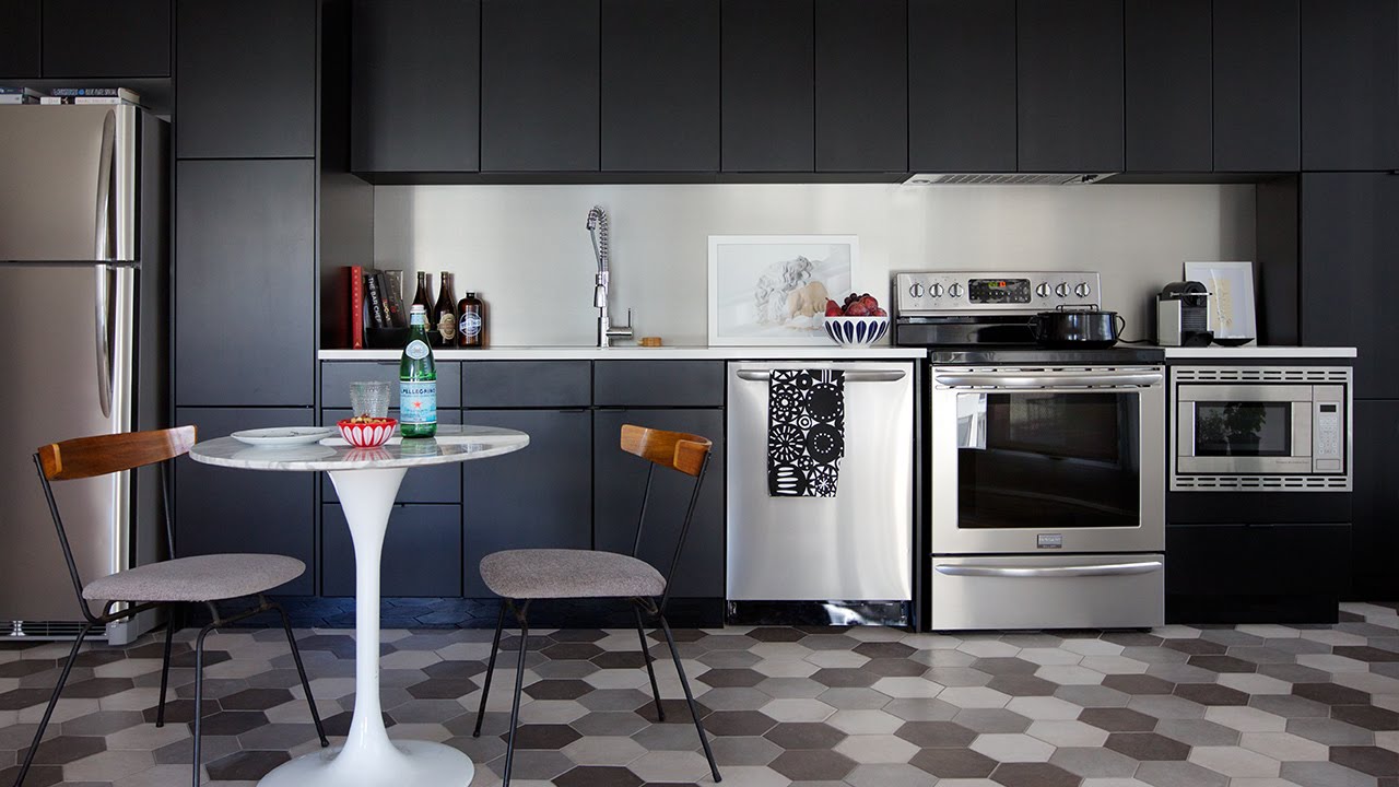 Modern RTA kitchen cabinets in a sleek black minimalist kitchen