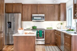 Kitchen Cabinet Toronto with warm wood cabinets, white countertops, and modern layout