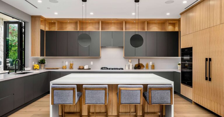 Premium kitchen cabinets in a modern kitchen with wood finishes, matte black doors, and a large island