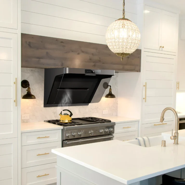 Modern white kitchen cabinet design with island, marble backsplash, and wall-mounted range hood