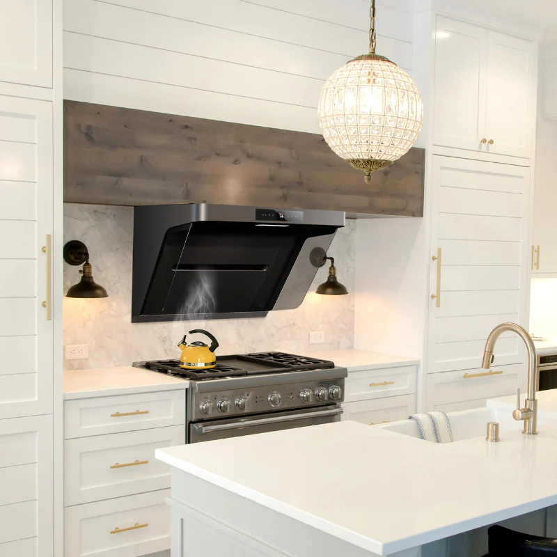 Modern white kitchen cabinet design with island, marble backsplash, and wall-mounted range hood