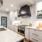 modern white rta kitchen cabinets with marble countertops and black hardware