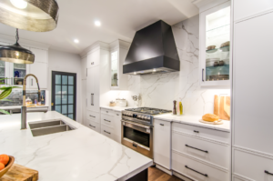 modern white rta kitchen cabinets with marble countertops and black hardware